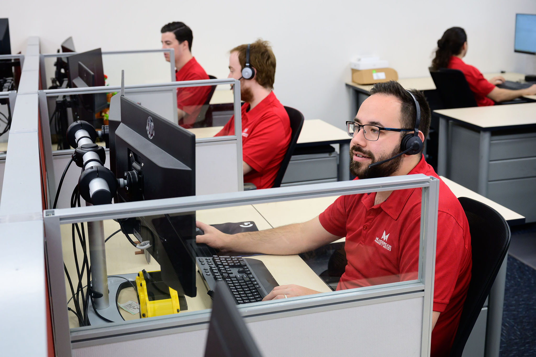 Milnsbridge support team working at their desks
